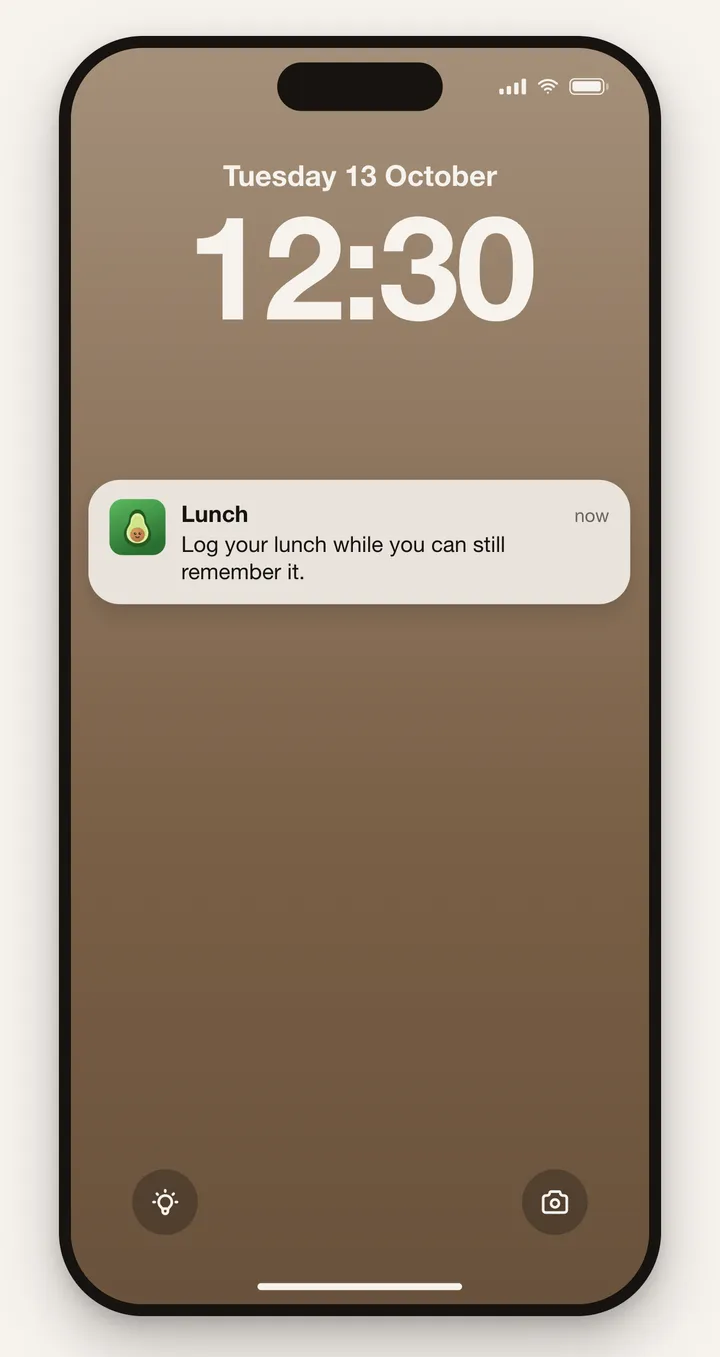 A lock screen at 12:30 with AVO's lunch reminder: log your lunch while you can still remember it
